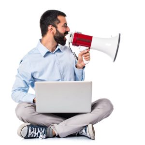 man-with-laptop-shouting-by-megaphone-min man-with-laptop-shouting-by-megaphone-min